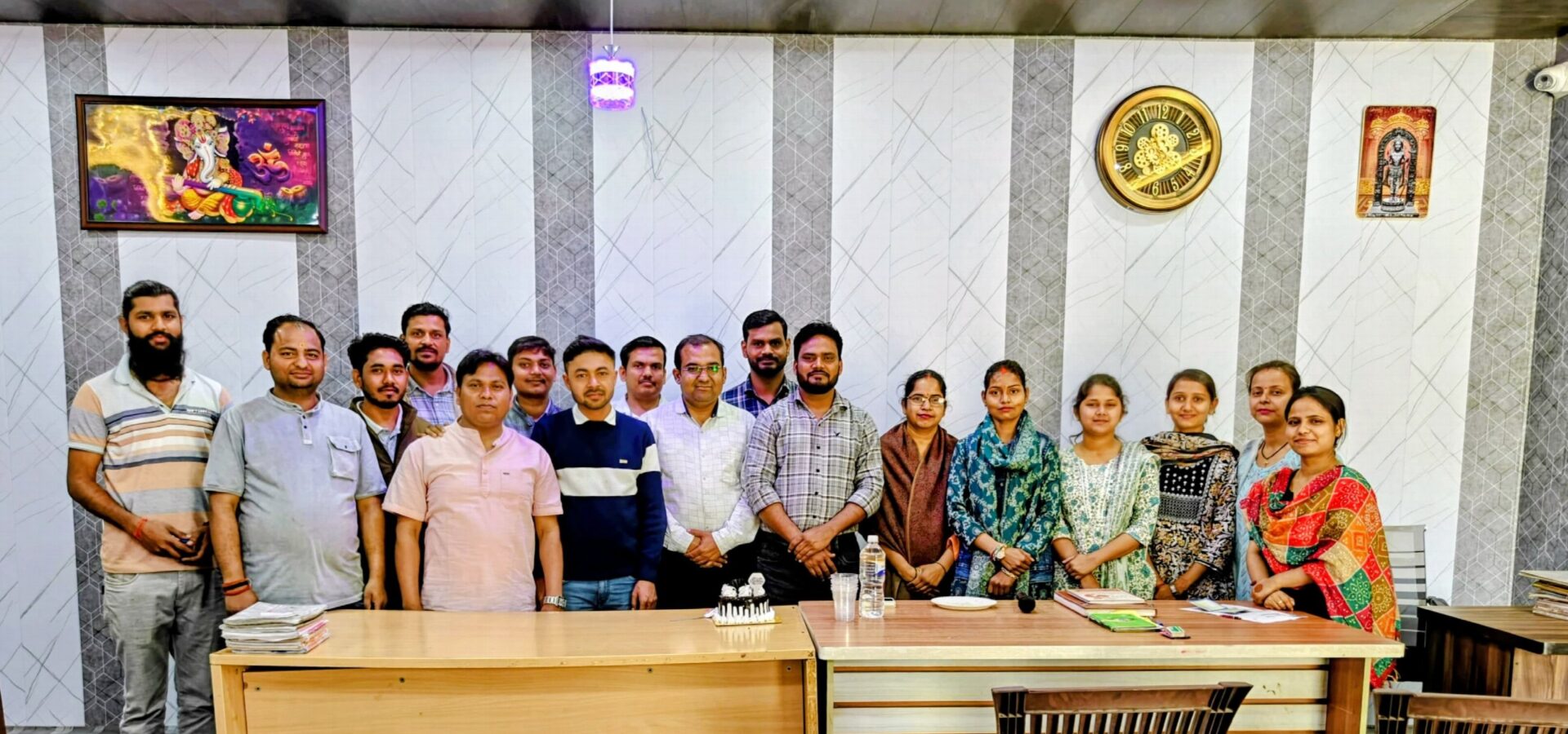 Teachers and staff of Karpoori Thakur Intermediate College assembled for a group photograph in the college hall