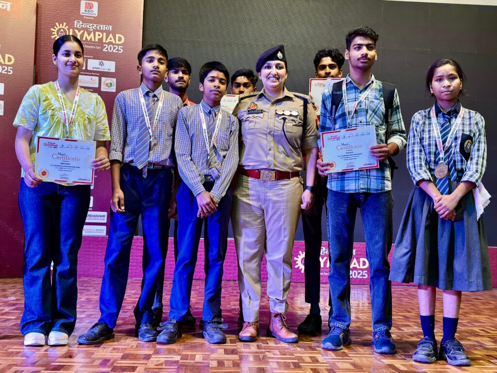 Group of students with achievement certificates and trophies at Karpoori Thakur Intermediate College