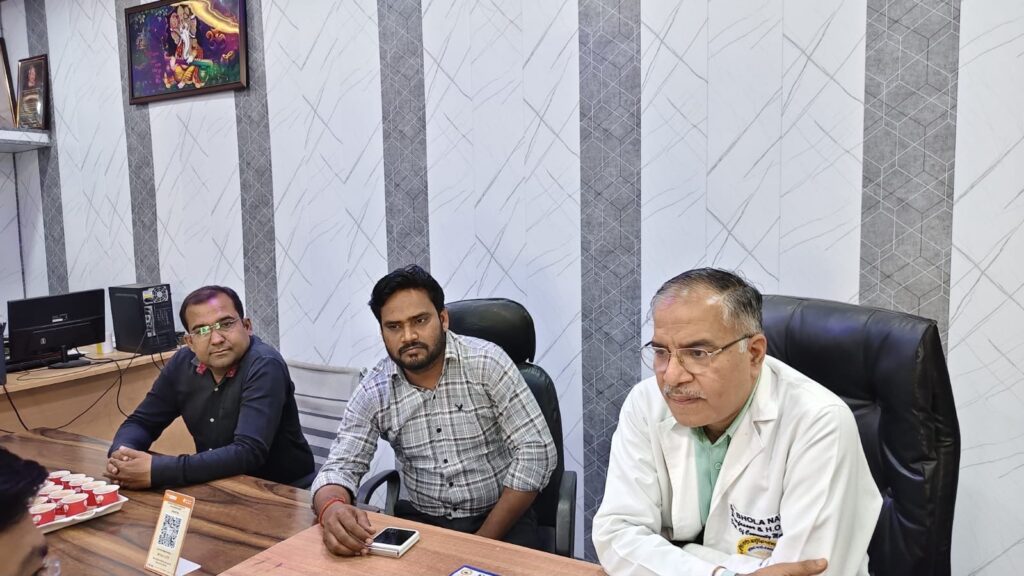 Visiting doctors from AIIMS Raebareli seated with school staff around the table in the college office